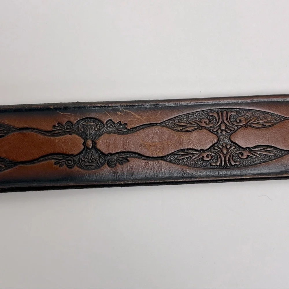 Brown tooled leather belt, unisex, approximately 34” see measurements in photos.